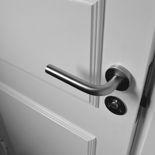 semi open white wooden door